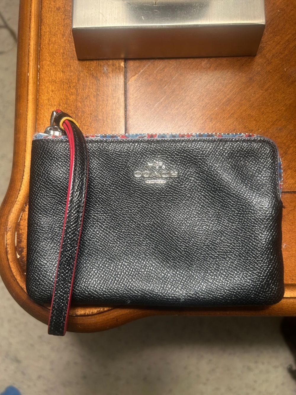 Coach Black Pebbled Leather Wristlet with Red-Trim Strap